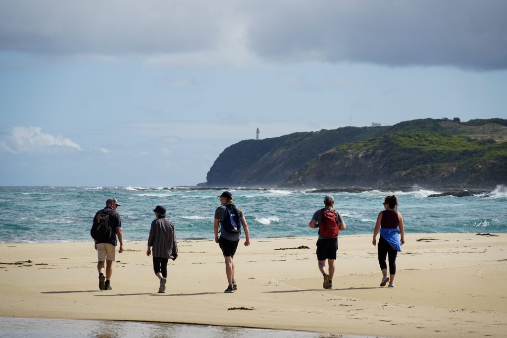 Walkers enjoying the views of Cape Otway Lightstation in the distance. 