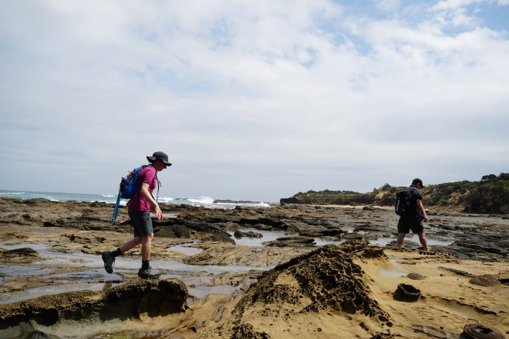 Walking towards Cape Otway Lighthouse on the Great Ocean Walk. 